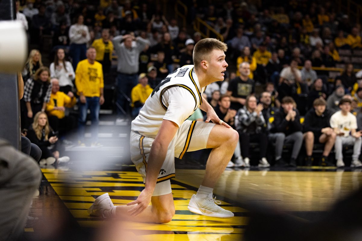 Iowa guard Bennett Stirtz gets up from the ground during a basketball game between the Iowa Hawkeyes and the Rutgers Scarlet Knights at Carver-Hawkeye Arena on Tuesday, Jan. 20, 2026. Stirtz had 20 points. The Hawkeyes defeated the Scarlet Knights 68-62. (Samantha DeFily/The Daily Iowan)