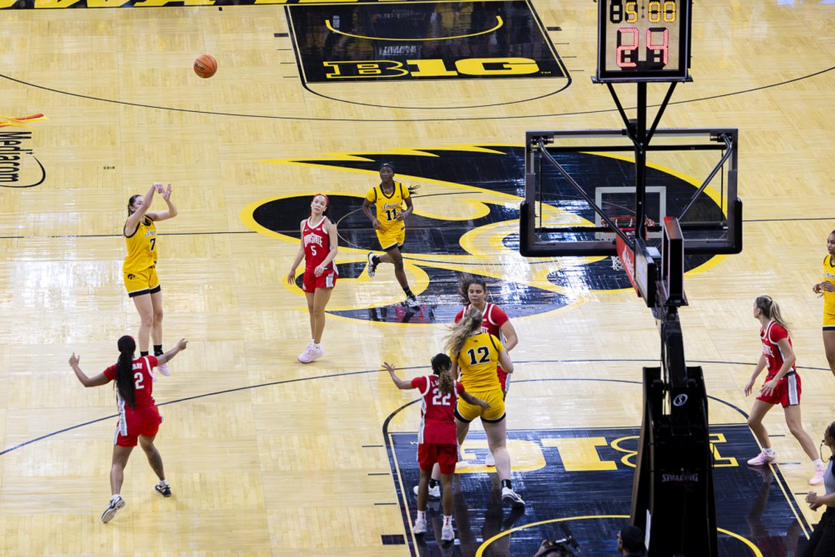 Iowa freshman guard Addison Deal attempts a 3-pointer at the basketball game between Iowa and Ohio State at Carver-Hawkeye Arena on Sunday, Jan. 25, 2026. After Iowa starting senior guard got injured, Deal stepped in to play the most minutes in her career with the hawks and put up her highest points with 20. Iowa beat Ohio State 91-70, making this their eight consecutive win. (Travis Crabb/Daily Iowan)