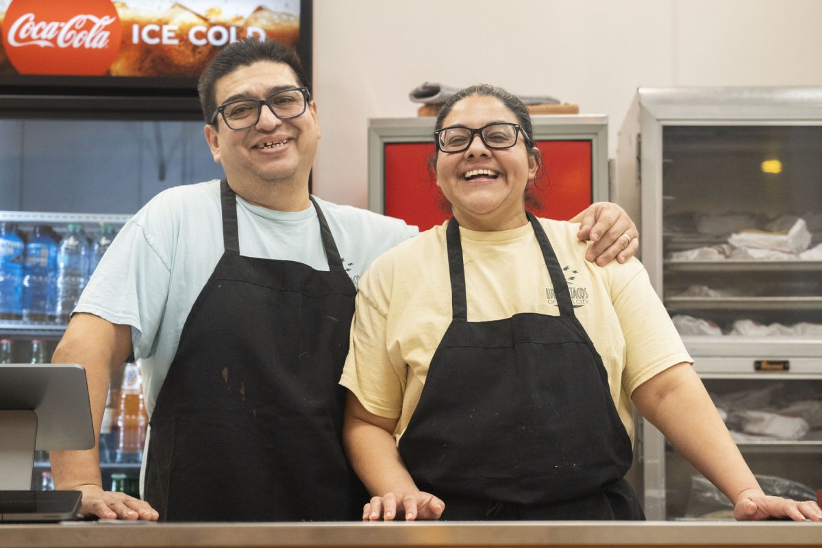 Isabel Garcia Luna and her husband, Salatiel, pose for a portrait at the new Luna’s Tacos storefront in Iowa City on Jan. 24. Luna’s Tacos stays open until 2:30 a.m. on weekends, attracting traffic from bargoers. 