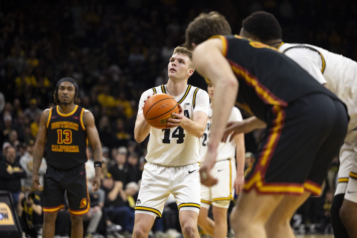 Iowa guard Bennett Stirtz prepares to shoot a free throw during a basketball game between the Iowa Hawkeyes and the Southern California Trojans at Carver-Hawkeye Arena on Wednesday, Jan. 28, 2026. The Hawkeyes defeated the Trojans, 73-72. (Samantha DeFily/The Daily Iowan)