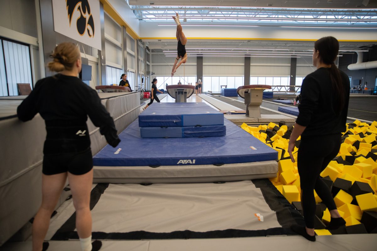 First year Sophie Schriever competes her vault on Saturday, Dec. 6, 2025 at the Nagle-Duda Gymnastics & Spirit Squads Training Center.