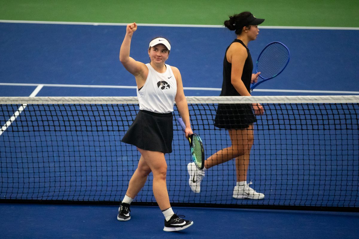 Iowa junior Mia Mack celebrates to the crowd after she beat Wichita State Xin Tong Wang 6-4 and 7-5 at a tennis match between Iowa and Wichita State in the Hawkeye Tennis and Recreational Complex on Sunday, Feb. 1, 2026. The Hawkeyes lost 2-4 to the Shockers, making this their third loss in a row. (Travis Crabb/The Daily Iowan)
