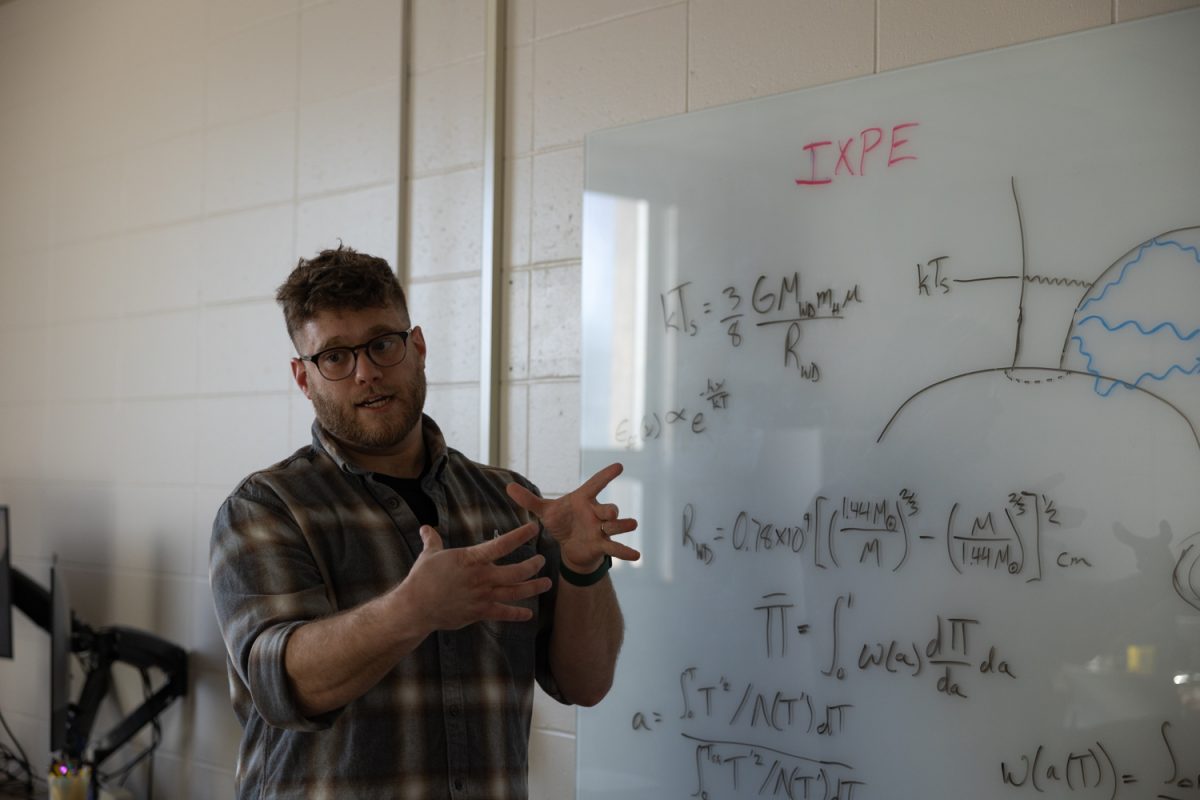 Dustin Swarm, a University of Iowa assistant professor of physics, speaks about his research on imaging dwarf stars Monday, Feb. 2, 2026, in Van Allen Hall in Iowa City, Iowa. Swarm received a $1 million NASA grant in 2024 to develop the imaging technology used in his research. (Liz Sleper/The Daily Iowan)