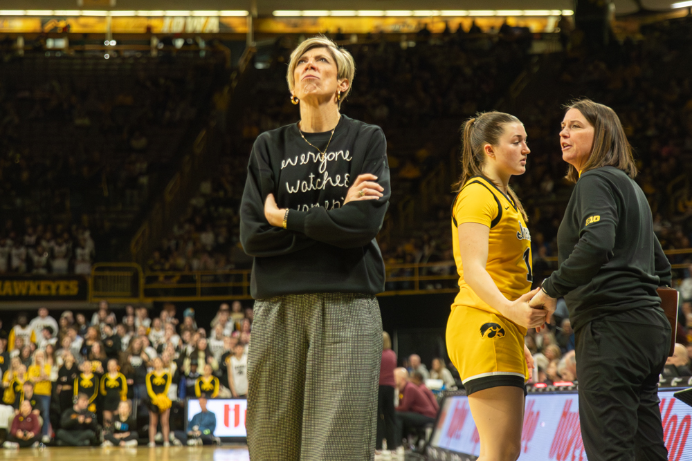 Iowa coach Jan Jensen looks up at the jumbotron during a basketball game between the Iowa Hawkeyes and the Minnesota Gophers at Carver-Hawkeye Arena on Thursday, Feb. 5th, 2026. She is upset with the call the refs made. Iowa lost to Minnesota 91-85. (Andy Espineira/The Daily Iowan)