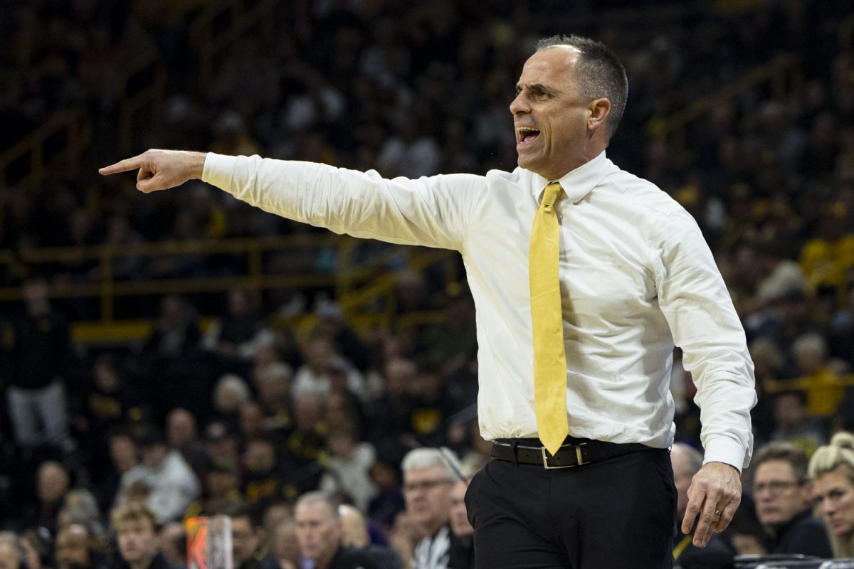 Iowa head coach Ben McCollum yells out and points at players that are on the court during a basketball game between the Iowa Hawkeyes and the Northwestern Wildcats at Carver-Hawkeye Arena on Sunday, Feb. 8, 2026. The Hawkeyes defeated the Wildcats 76-70. (Samantha DeFily/The Daily Iowan)