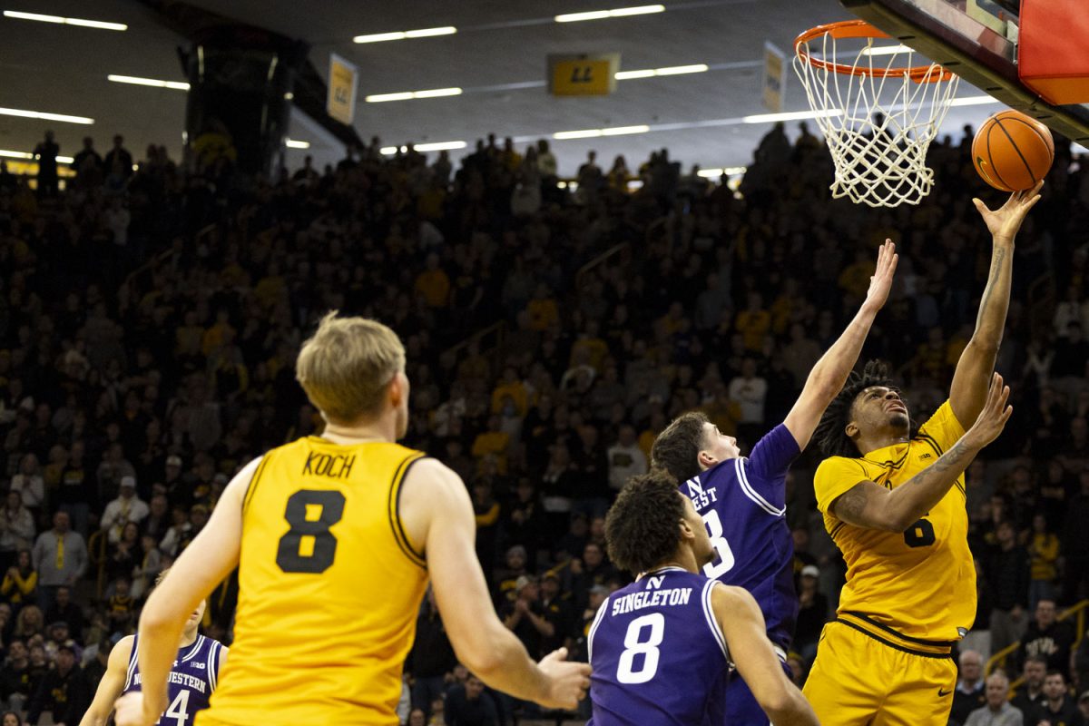 Iowa guard Tavion banks goes for a layup during a basketball game between the Iowa Hawkeyes and the Northwestern Wildcats at Carver-Hawkeye Arena on Sunday, Feb. 8, 2026. The Hawkeyes defeated the Wildcats 76-70. (Samantha DeFily/The Daily Iowan)