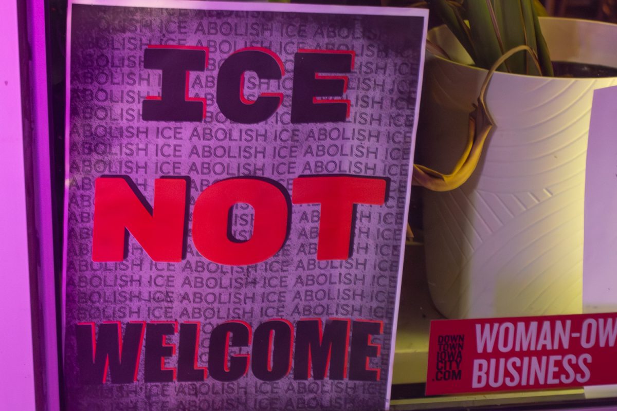 Iowa City businesses post “Ice Not Welcome” posters on their window front protesting Ice in Iowa City.