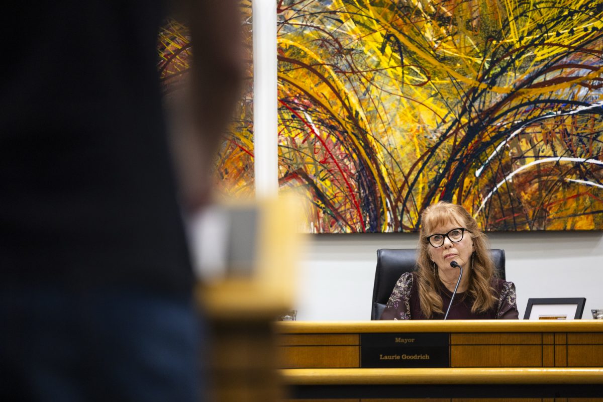Coralville Mayor Laurie Goodrich listens to public comment during a Coralville City Council meeting in Coralville, Iowa, on Tuesday, Feb. 10, 2026. Coralville residents gathered to ask the council the cancel their $36,000 two-year contract with Flock Safety, which has two automated license-plate reader cameras in the city, with six slated overall.
