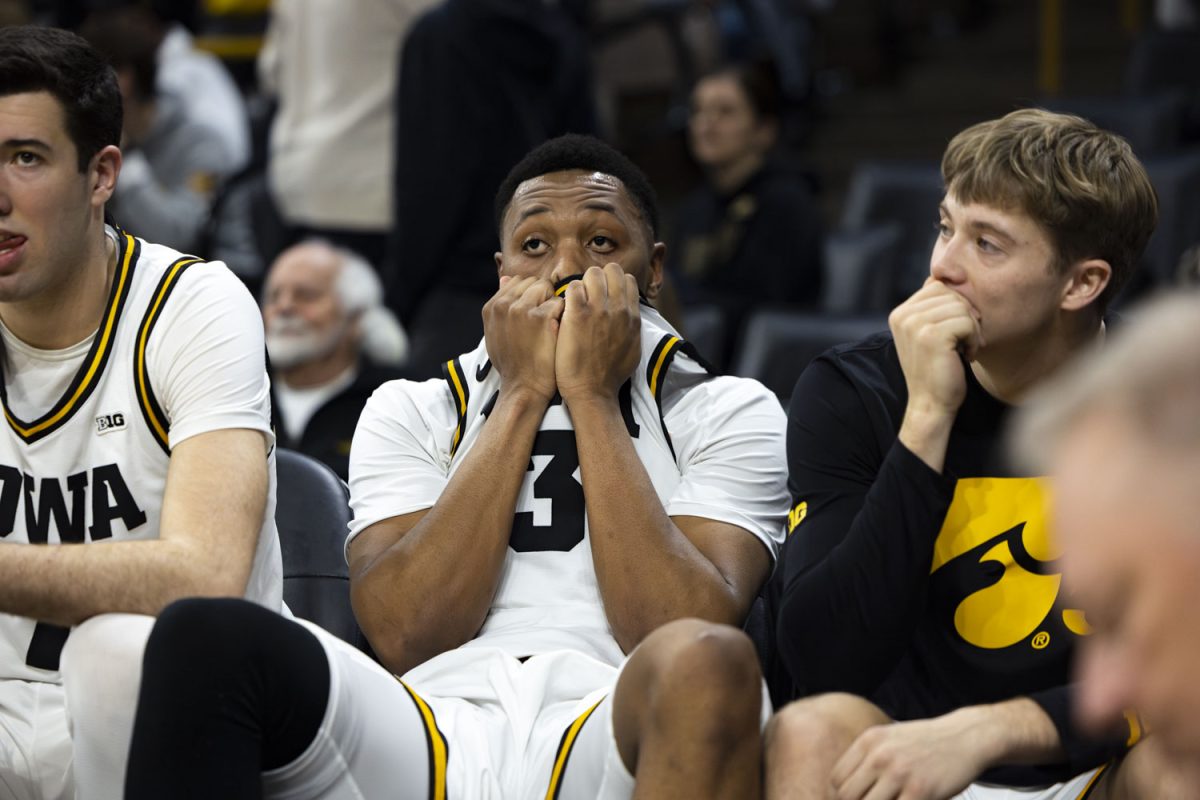 Iowa forward Cam Manyawu pulls his jersey down his face during a basketball game between the Iowa Hawkeyes and the No. 13 Purdue Boilermakers at Carver-Hawkeye Arena on Saturday, Feb. 14, 2026. The Boilermakers defeated the Hawkeyes, 78-57. (Samantha DeFily/The Daily Iowan)