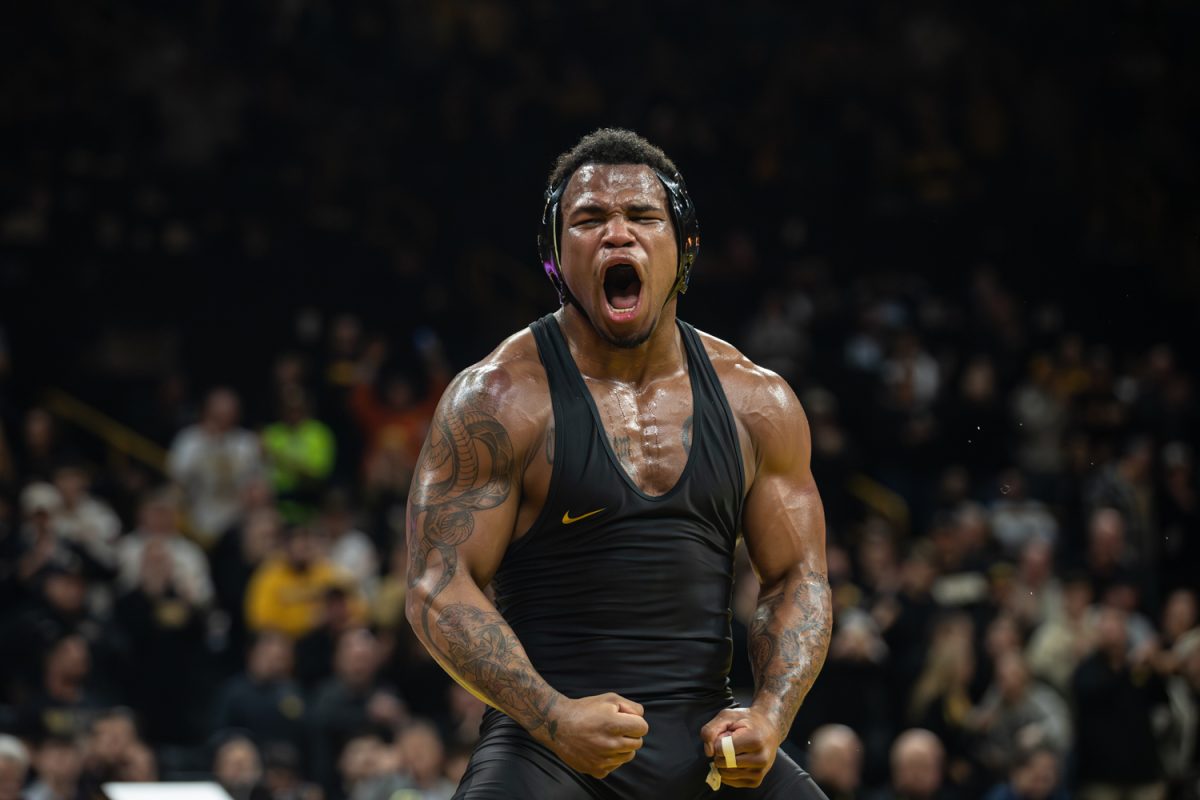 Iowa 184-pounder Gabe Arnold celebrates after defeating Michigan’s No. 7 Brock Mantanona during the Pioneer Showdown between the No. 7 Iowa Hawkeyes and the No. 10 Michigan Wolverines at Carver-Hawkeye Arena in Iowa City, Iowa on Friday, Feb. 13, 2026. Arnold defeated Mantanona by decision, 3-2. The Hawkeyes defeated the Wolverines 19-17. (Dexter Westbay/Daily Iowan)