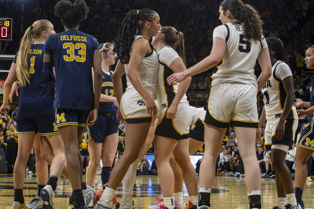 Iowa senior forward, Hannah Stuelke, celebrates with her teammates at the basketball game between Iowa and Michigan in Iowa City at Carver-Hawkeye Arena on Sunday, Feb. 22, 2026. Iowa leads at half 27-20. (Alejandro Santos/Daily Iowan)