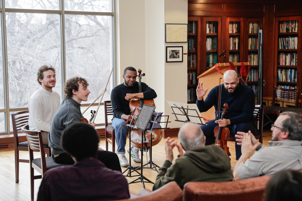 Devin Moore plays the violin in the Dey House, in Iowa City, IA, on Tuesday, Feb. 24, 2026. The Isidore string quartet had an hourlong concert, consisting of contemporary works and classical music.