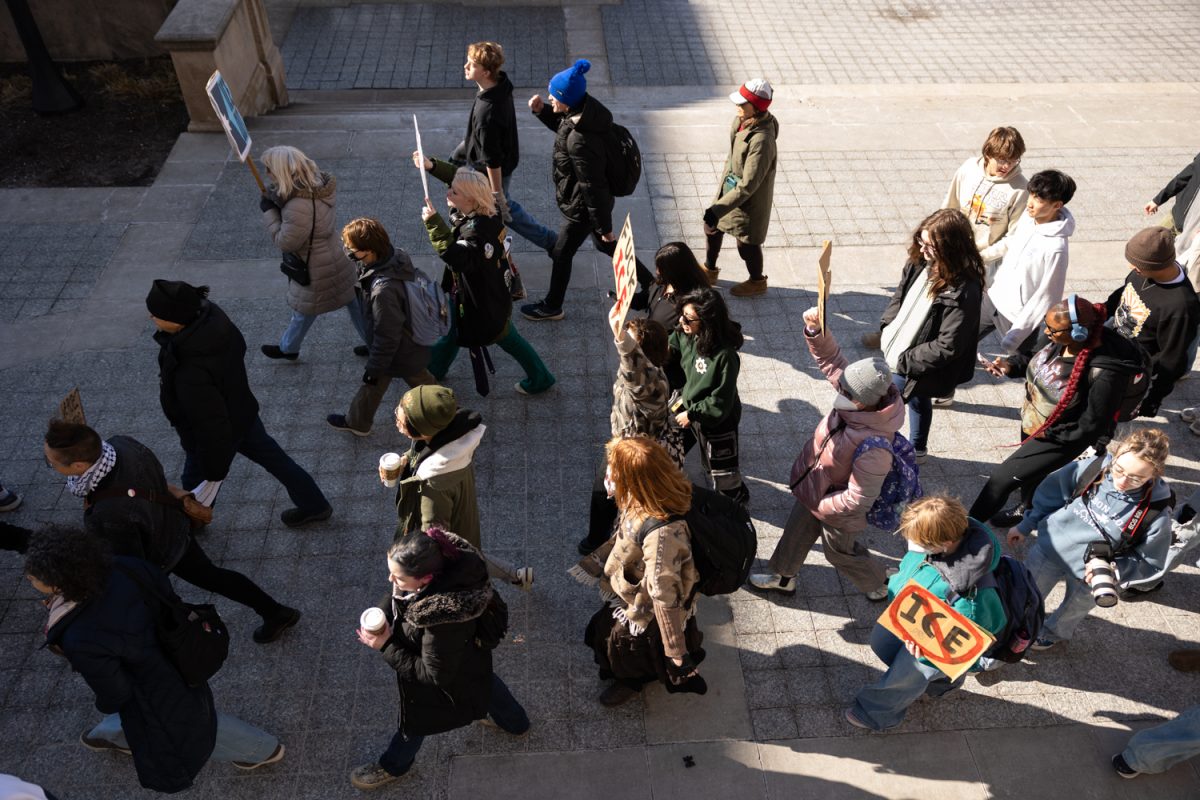 Protesters march during a protest against ICE at the Pentacrest in Iowa City on Thursday, Feb. 5, 2026. The protest was made up of mostly high-school and middle-school aged students. (Liz Sleper/The Daily Iowan)