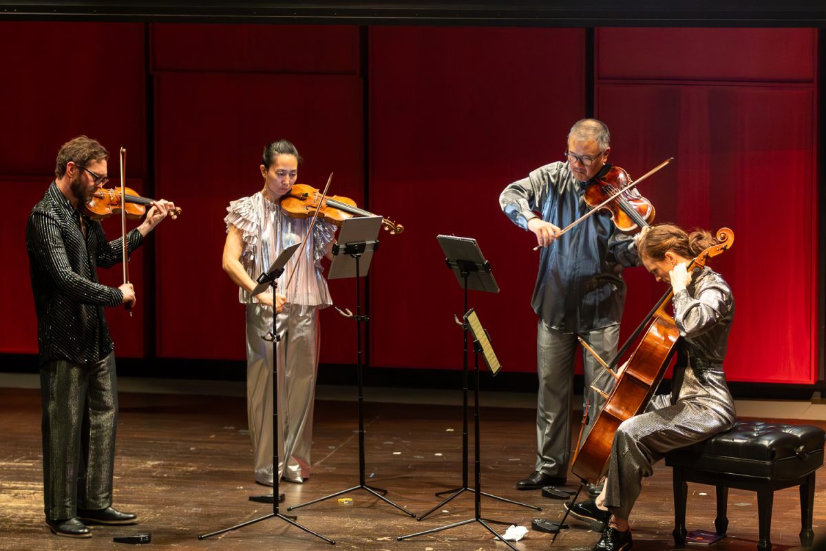 Del Sol Quartet members Hyeyung Sol Yoon and Benjamin Kreith on violins, Charlton Lee on viola, and Kathryn Bates on cello perform during a guest artist recital at the Voxman Music Building on Saturday, Feb. 21, 2026.