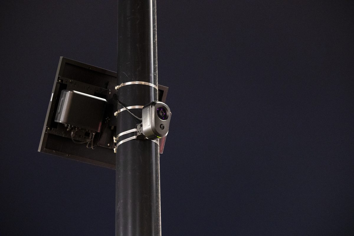 A Flock Safety camera is seen near the Davenport I-80 entry ramp in Coralville, Iowa, on Tuesday, Feb. 24, 2026. Coralville City Council voted to cancel the $36,000 two-year contract with Flock Safety, which has two automated license-plate reader cameras in the city. The cameras are set to be removed in the following days.