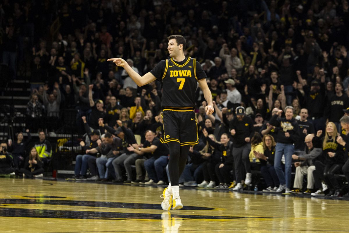 Iowa forward Alvaro Folgueiras celebrates during a basketball game between the Iowa Hawkeyes and the No. 9 Nebraska Cornhuskers at Carver-Hawkeye Arena on Tuesday, Feb. 17, 2026. The Hawkeyes upset the Cornhuskers, 57-52. (Samantha DeFily/The Daily Iowan)