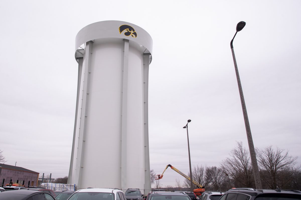 The new Iowa City water tower stands in parking lot 75 near the Iowa football practice fields in Iowa City, Iowa, on Monday, March 3, 2026. The tower is being gradually introduced to the University of Iowa water system through March 9, 2026.