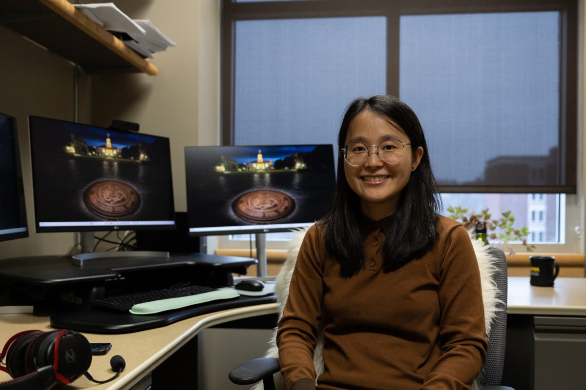 Bingbing Zhang, assistant professor of journalism at the University of Iowa, works in her office in the Adler Journalism Building on Tuesday, March 3, 2026, in Iowa City, IA. Zhang is currently studying the effects of emerging technologies, like artificial intelligence, on journalism.