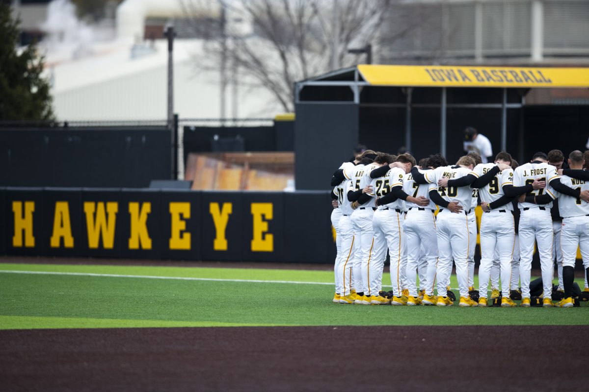 The Iowa baseball team huddles up before a baseball game between the Iowa Hawkeyes and the Loras Duhawks at Duane Banks Field on Wednesday, March 4, 2026. The Hawkeyes defeated the Duhawks, 10-0. (Samantha DeFily/The Daily Iowan)