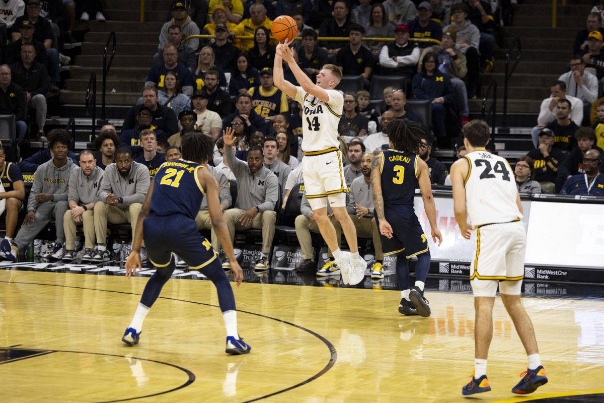 Iowa guard Bennett Stirtz shoots from beyond the arc during a men’s basketball game between the Iowa Hawkeyes and University of Michigan Wolverines at Carver-Hawkeye Arena on Thursday, March 5, 2026. The Wolverines defeated the Hawkeyes, 71-68. (Samantha DeFily/The Daily Iowan)