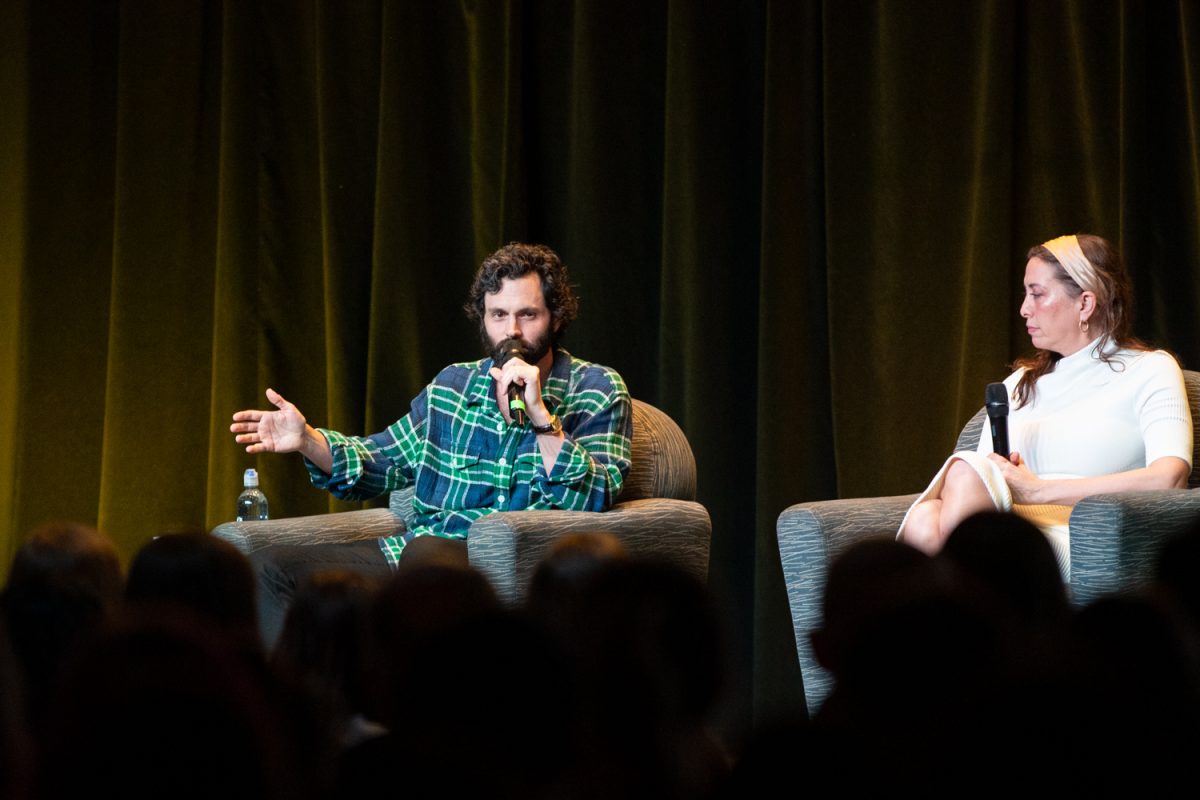 Penn Badgley speaks during “Can We Talk?” with Badgley and Dr. Nura Mowzoon in the Iowa Memorial Union on Thursday, March 5, 2026. The actor and psychotherapist posed and answered questions about love and relationships for nearly 900 attendees. This was the first of The University of Iowa Lecture Committee &amp; Late Night events. (Ava Neumaier / The Daily Iowan)