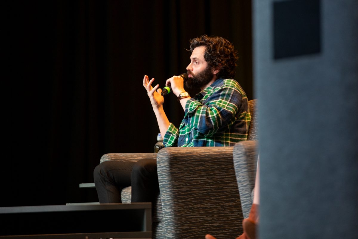 Penn Badgley speaks during “Can We Talk?” with Badgley and Dr. Nura Mowzoon in the Iowa Memorial Union on Thursday, March 5, 2026. The actor and psychotherapist posed and answered questions about love and relationships for nearly 900 attendees. This was the first of The University of Iowa Lecture Committee &amp; Late Night events. (Ava Neumaier / The Daily Iowan)
