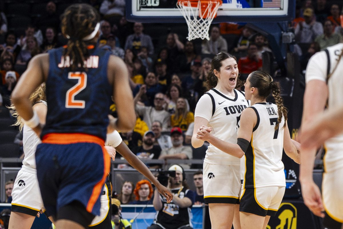 Iowa center Ava Heiden and Iowa guard Addie Deal celebrate during a basketball game between No. 9 Iowa and Illinois at the Big Ten Women’s Basketball Tournament at Gainbridge Fieldhouse in Indianapolis on Friday, March 6, 2026. The Hawkeyes defeated the Fighting Illini, 64-58.