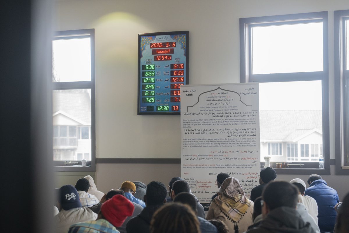 Attendees participate in Friday prayer at Osama Sharairi in Coralville on Friday, March 7.  Osama Sharairi is one of the two locations that hold communal prayer in Johnson County and has been open for two years.