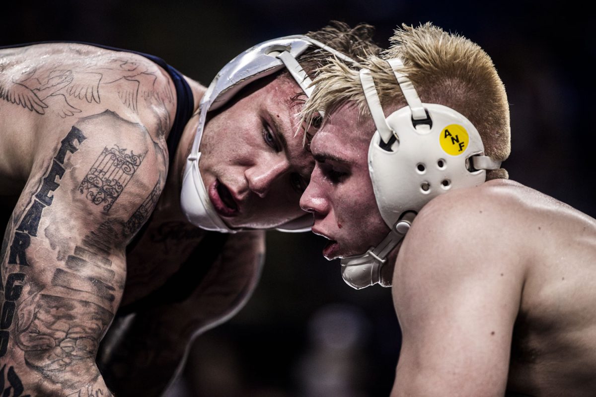 Iowa 184-pounder, No. 8 Angelo Ferrari fights for head position against Penn State's No. 1 Rocco Welsh during Session One of the Big Ten Championships at the Bryce Jordan Center in State College, Pennsylvania on Saturday, Mar. 7, 2026. Welsh defeated Ferrari  3-2. The Iowa Hawkeyes qualified ten athletes for the tournament and are ranked No. 4 in the tournament standings. The Big10 Championship hosts the universities of Iowa, Penn State, Nebraska, Ohio State, Minnesota, Michigan State, Indiana, Purdue, Rutgers, Wisconsin, Northwestern, Maryland, and Illinois. (Reece Schrader/Daily Iowan)