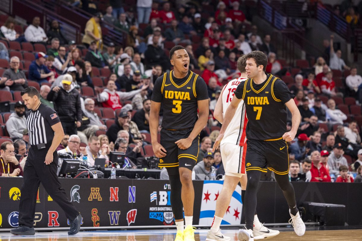 Iowa forwards Cam Manyawu and Alvaro Folgueiras celebrate during a basketball game between the No. 9 seed Iowa Hawkeyes and the No. 8 seed Ohio State Buckeyes at the United Center in Chicago, Illinois on Thursday, March 12, 2026. The Buckeyes defeated the Hawkeyes, 72-69. (Samantha DeFily/The Daily Iowan)