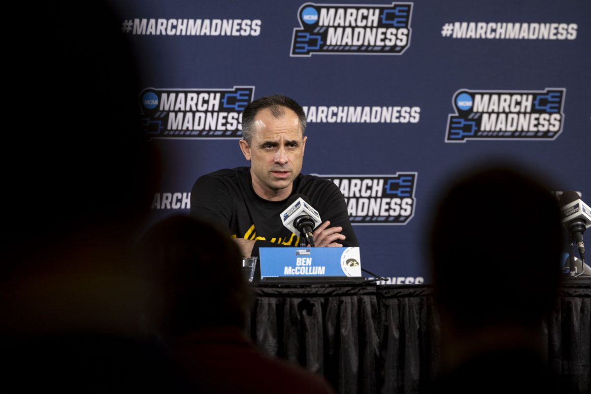 Iowa head coach Ben McCollum speaks with reporters during open practice and media availability with the No. 9 seed Iowa Hawkeyes and the No. 8 seed Clemson Tigers at the Benchmark International Arena in Tampa, Florida on Thursday, March 19, 2026. The Hawkeyes and Tigers will face off on Friday, March 20, at 5:50pm CST. (Samantha DeFily/The Daily Iowan)