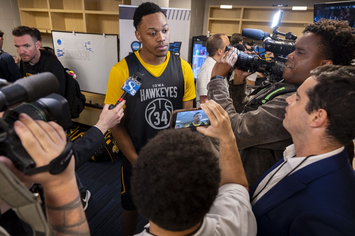 Iowa forward Cam Manyawu speaks with reporters during open practice and media availability with the No. 9 seed Iowa Hawkeyes and the No. 8 seed Clemson Tigers at the Benchmark International Arena in Tampa, Florida on Thursday, March 19, 2026. The Hawkeyes and Tigers will face off on Friday, March 20, at 5:50pm CST. (Samantha DeFily/The Daily Iowan)