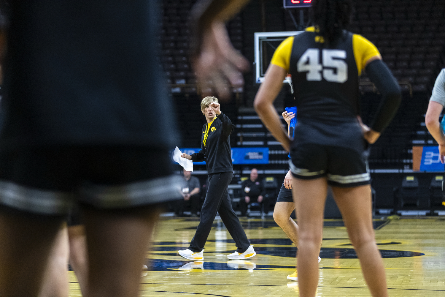 Iowa head coach Jan Jensen calls out to players during an open practice at Carver-Hawkeye Arena on Friday, March 20, 2026. Iowa will face Farleigh Dickinson on Saturday at Carver-Hawkeye Arena.