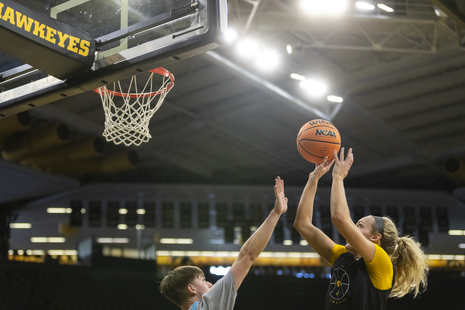 Iowa guard Kylie Feuerbach shoots a layup during an open practice at Carver-Hawkeye Arena on Friday, March 20, 2026. Iowa will face Farleigh Dickinson on Saturday at Carver-Hawkeye Arena.