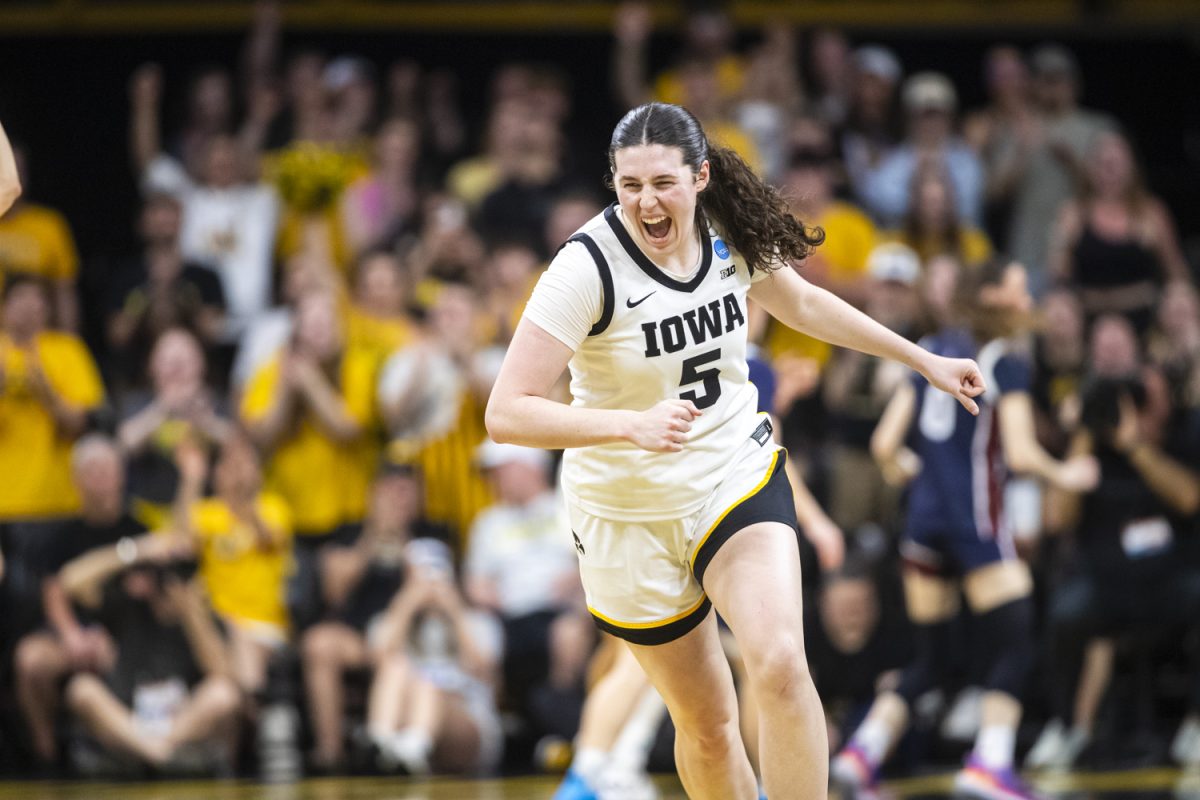 Iowa Hawkeyes center Ava Heiden (5) celebrates after a score during a basketball game between the No. 2 seed Iowa Hawkeyes and the No. 15 seed Fairleigh Dickinson Knights at Carver-Hawkeye Arena in Iowa City, Iowa, on Saturday, March 21, 2026. The Hawkeyes defeated the Knights, 58-48.