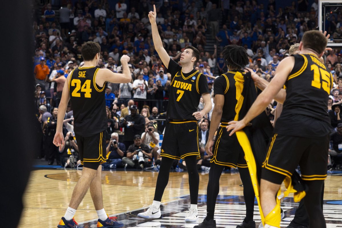 Iowa forward Alvaro Folgueiras points up during a basketball game between the No. 9 seed Iowa Hawkeyes and the No. 1 seed Florida Gators at the Benchmark International Arena in Tampa, Florida on Sunday, March 22, 2026. The Hawkeyes upset the Gators, 73-72. (Samantha DeFily/The Daily Iowan)