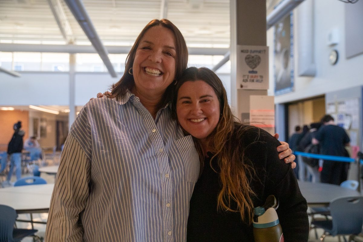 Ann Browning (left) and Caitlin Haskins (right) smile for a picture at Tate High School on Monday, March 23rd, 2026. Ann Browning, a principal at Tate High School, is retiring after 18 years. (Sarah Hughes / The Daily Iowan)