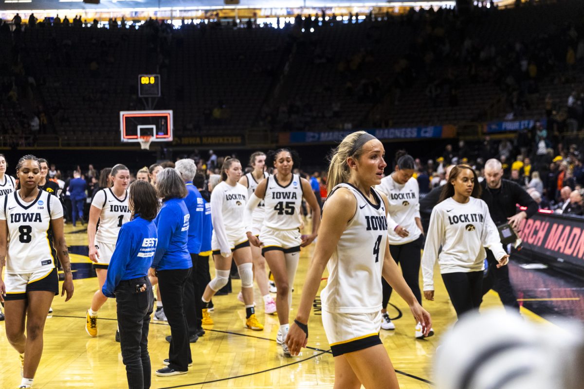 Iowa Hawkeyes guard Kylie Feuerbach (4) walks off the court after a second-round NCAA women’s basketball tournament game between the No. 2 seed Iowa Hawkeyes and the No. 10 seed Virginia Cavaliers at Carver-Hawkeye Arena in Iowa City on Monday, March 23, 2026. The Cavaliers defeated the Hawkeyes, 83-75.