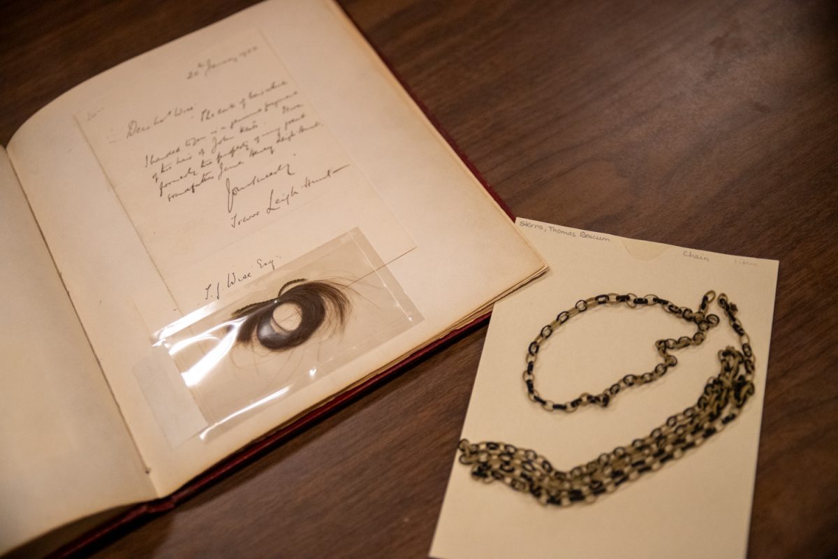 A watch chain made of braided hair is seen from the Sterns Family Papers and a lock of hair belonging to poet John Keats from the Brewer-Leigh Hunt collection on Monday, March 23, 2026. These pieces are stored at the Main Library archives. (Sarah Hughes / The Daily Iowan)