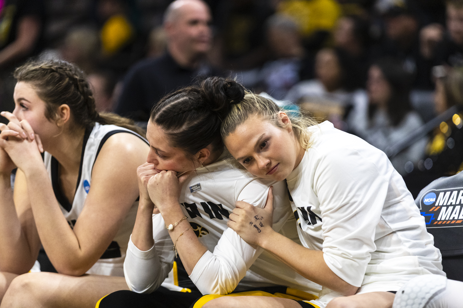 Iowa guard Callie Levin comforts guard Taylor McCabe during a second-round NCAA women’s basketball tournament game between the No. 2 seed Iowa Hawkeyes and the No. 10 seed Virginia Cavaliers at Carver-Hawkeye Arena in Iowa City on Monday, March 23, 2026. The Cavaliers defeated the Hawkeyes, 83-75.