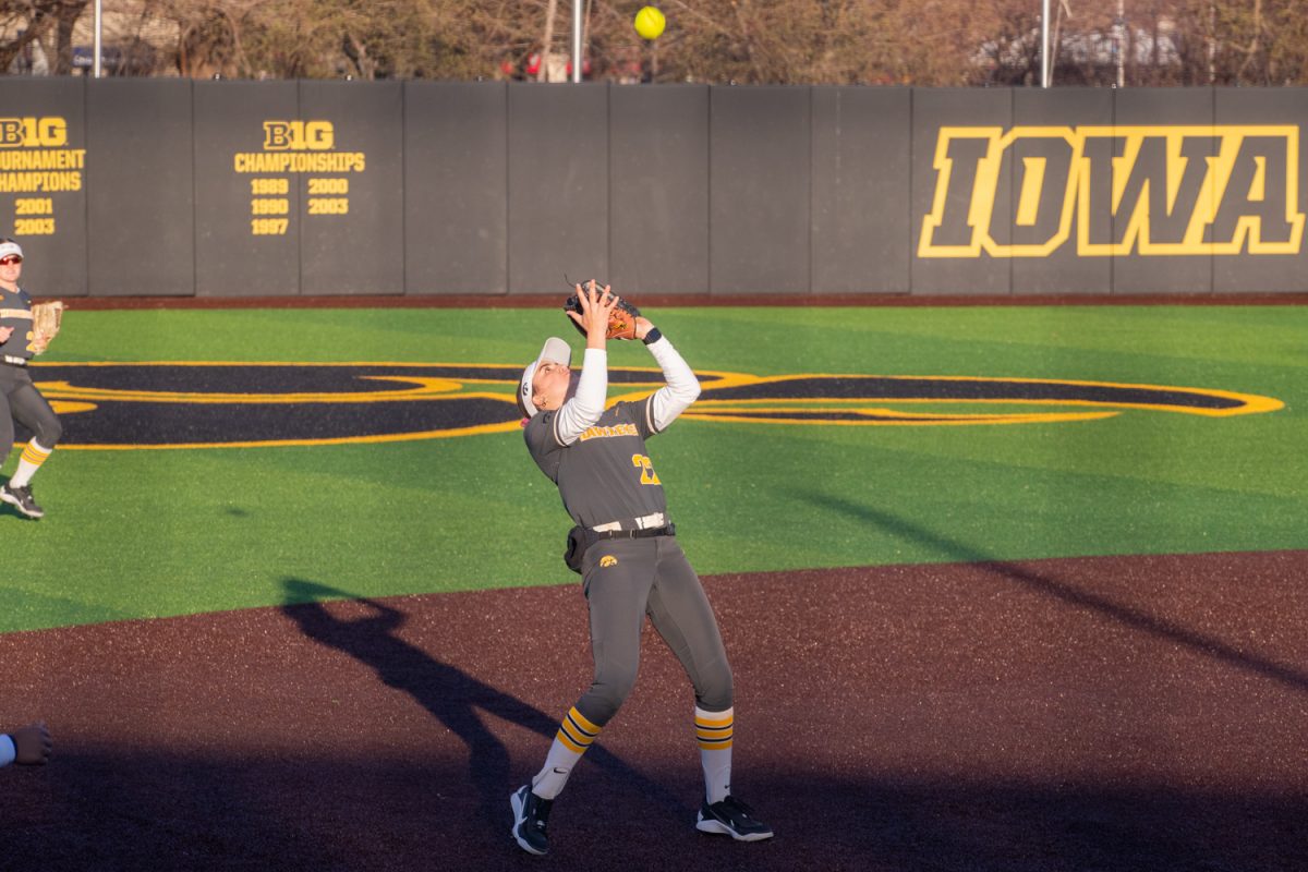 Iowa shortstop Brianna Johnson catches the ball to get an out at the softball game between Iowa and No. 16 Washington on Friday, March 27, 2026. Johnson had two putouts in the game against Washington. The Huskies handed the Hawks their biggest defeat of the season so far with a 16-7 win over Iowa. (Travis Crabb/The Daily Iowan)