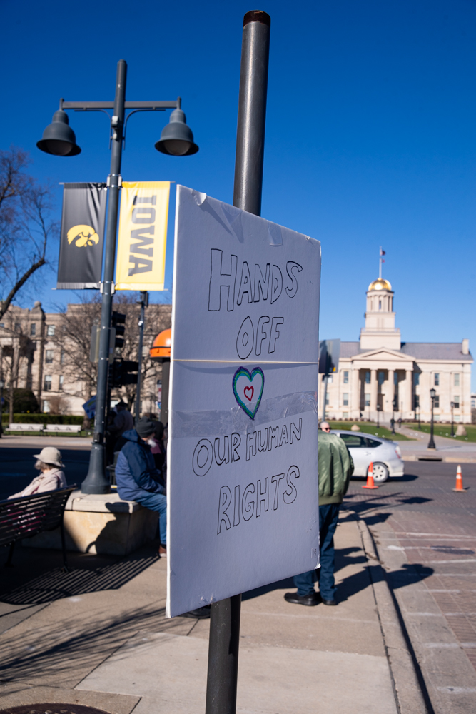 A handmade sign is seen during a “No Kings” protest in downtown Iowa City on Saturday, March 28, 2026. The Iowa City demonstration is part of protests taking place nationwide against President Donald Trump’s administration, ICE, and the war in Iran.
