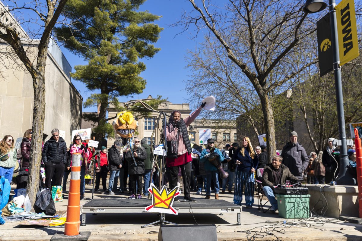 Iowa City City Councilor Mazahir Salih speaks during a “No Kings” protest in downtown Iowa City on Saturday, March 28, 2026. The Iowa City demonstration is part of protests taking place nationwide against President Donald Trump’s administration, ICE, and the war in Iran. (Gabby Drees/The Daily Iowan)