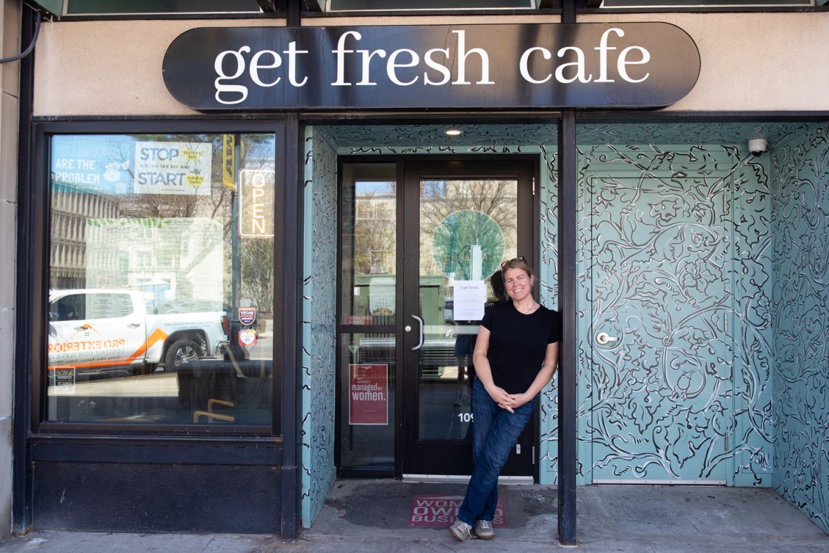 Wendy Zimmerman poses for a portrait outside Get Fresh cafe in Iowa City on Monday, March 30, 2026. Zimmerman’s business began as a stand at the Iowa City Farmer’s Market, like many other businesses in Iowa City. (Ava Neumaier / The Daily Iowan)