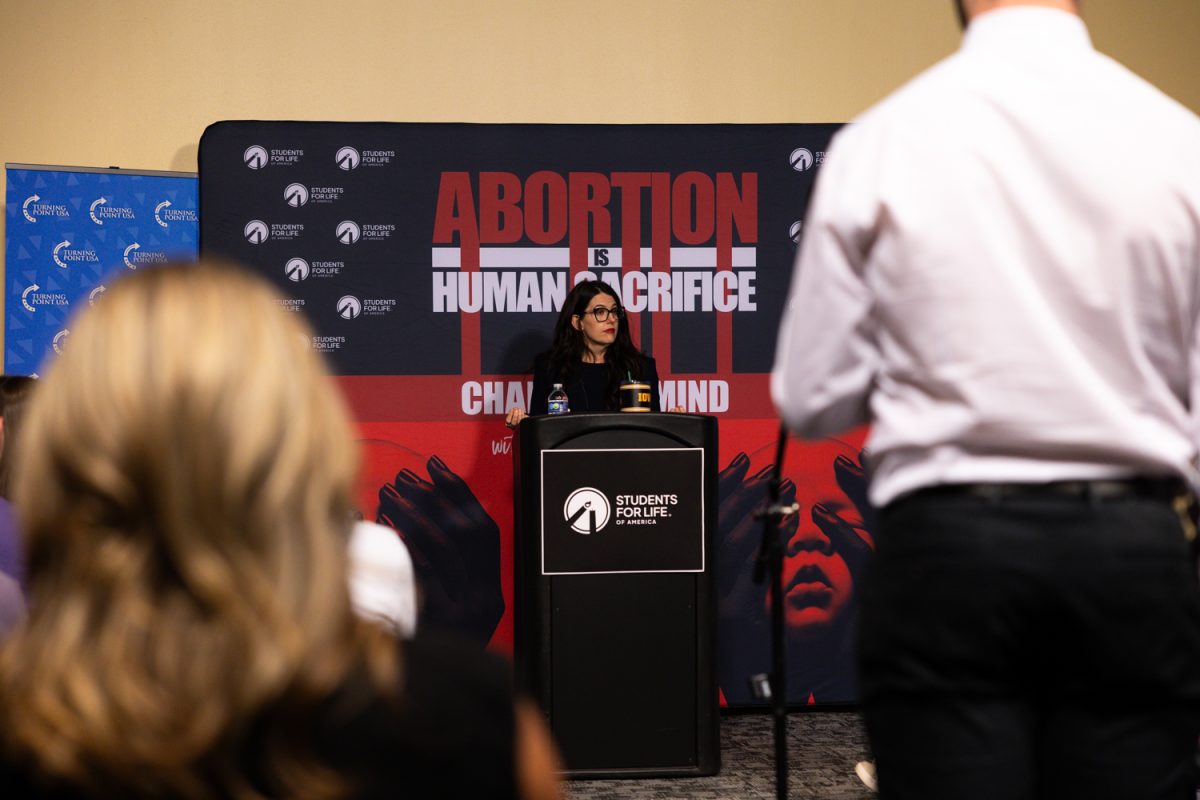 Kristan Hawkins addresses community members gathered for her “Change My Mind” event in the Black Box Theatre at the Iowa Memorial Union in Iowa City on Tuesday, March 31, 2026. During the event, Hawkins answered questions from the audience and defended her opinion that abortion is human sacrifice. (Liz Sleper / The Daily Iowan)