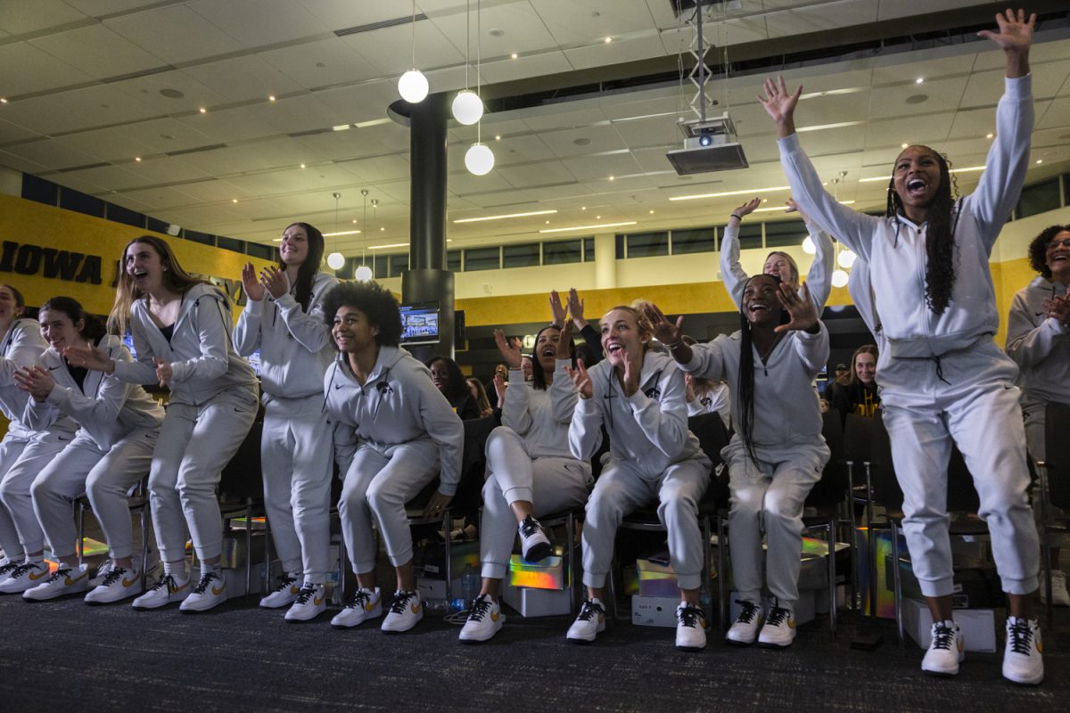 The Iowa women's basketball team reacts as their seed is announced during a Selection Sunday watch party at the Feller Club in Carver-Hawkeye Arena on Sunday, March 15, 2026. Iowa secured a two-seed in the NCAA tournament, facing Farleigh Dickinson on Saturday at Carver-Hawkeye Arena.