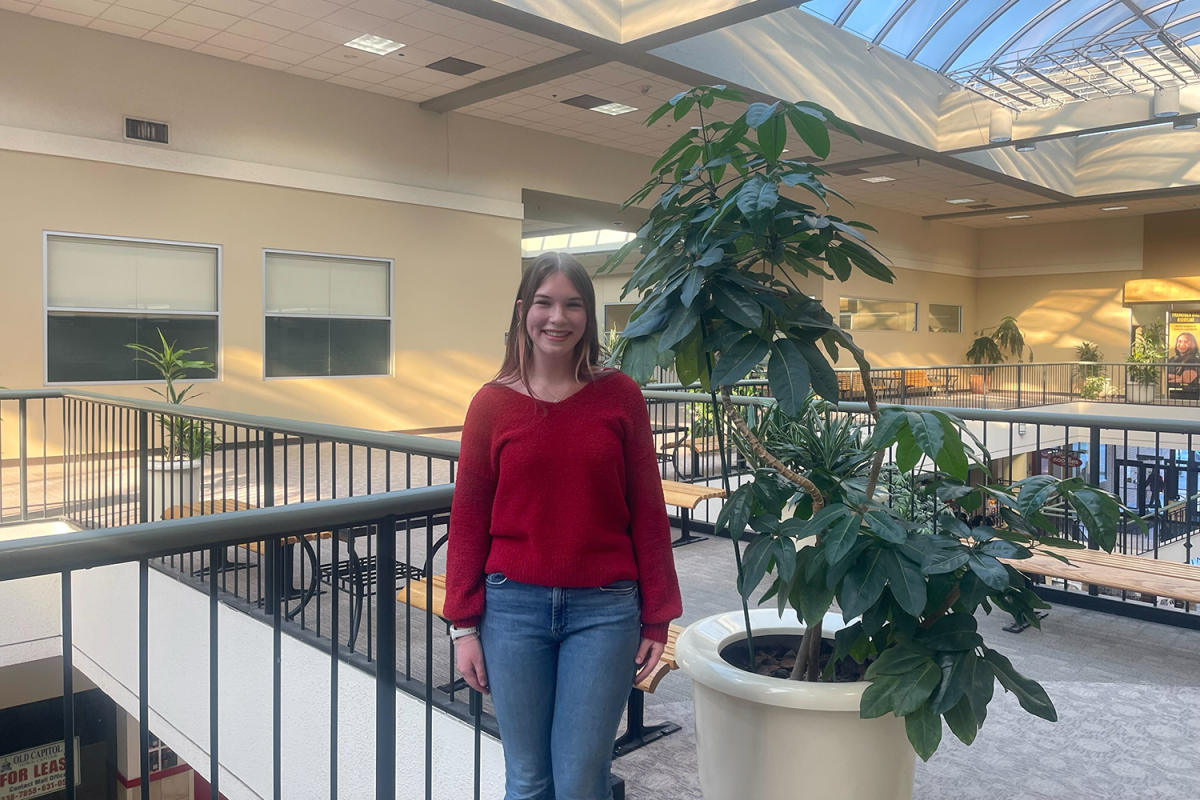 Josie Nabhan-Warren, a junior at West High, poses for a photo on the second floor of the Old Capital Mall in Iowa City, Iowa on Wednesday, March 11, 2026. She won the 2026-2027 Iowa Student Poet Ambassador which is the highest honor for a young writer in Iowa.