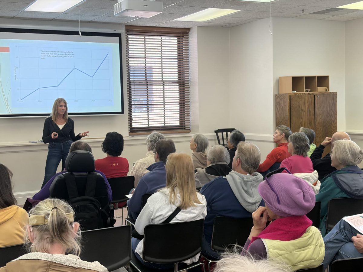 Iowa City Police Department Victim Services Coordinator Anna Thompson leads scam awareness program at the Iowa City Senior Center on March 27, 2026. The number of scam incidents has increased in recent years.