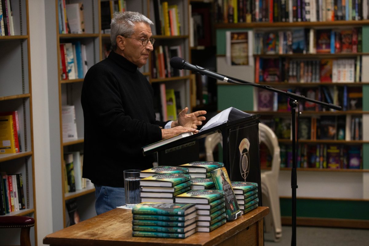 Novelist and University of Iowa alumnus Nicholas Meyer speaks during a reading on Tuesday, Oct. 29, 2019. Meyer has written three other Sherlock Holmes novels, including Seven-per-cent-solution, which was a best seller. (Emily Wangen/The Daily Iowan)