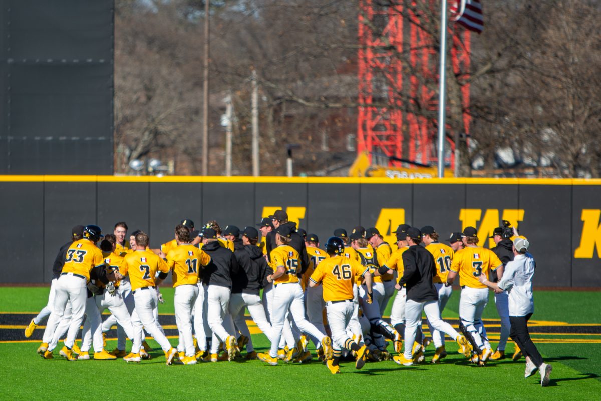 Iowa team celebrates in center field during a baseball game between Iowa and Lindenwood at Duane Banks Field on Wednesday, March 8, 2026. Iowa defeated Lindenwood, 10-9 in extra innings. (Andy Espineira/The Daily Iowan)